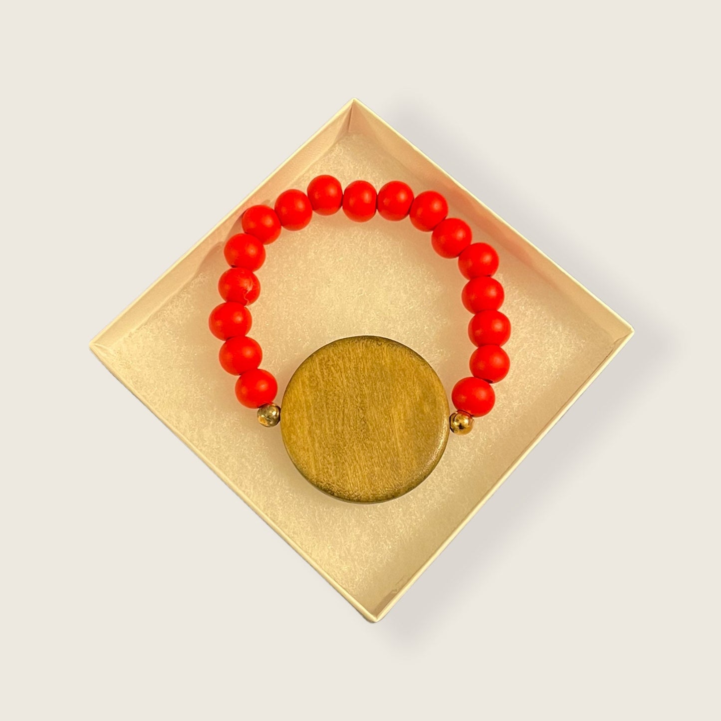 Our beaded wooded bracelet comes with a disk you can personalize. Chose from our designs, or we can design the one for you, just the way you
